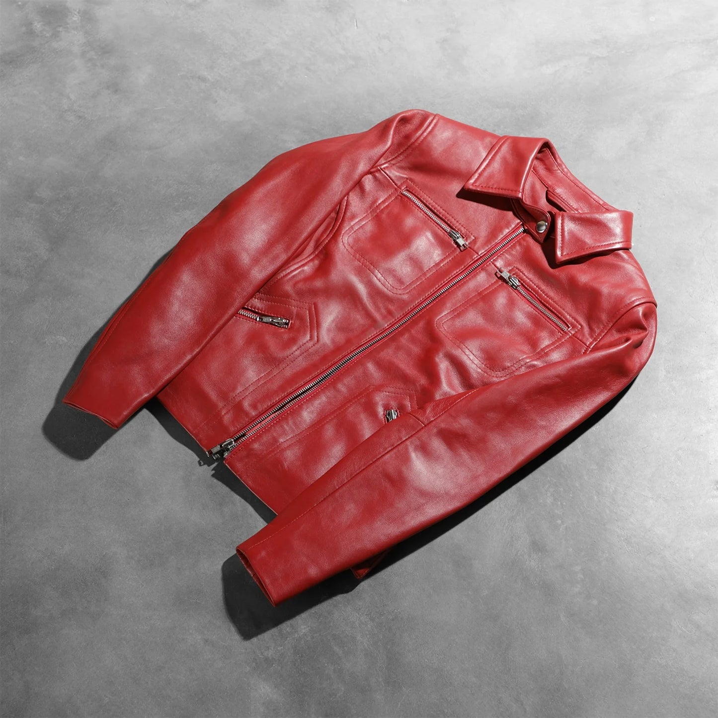 Close up showing the clean open hem cuff design on the sleeves.