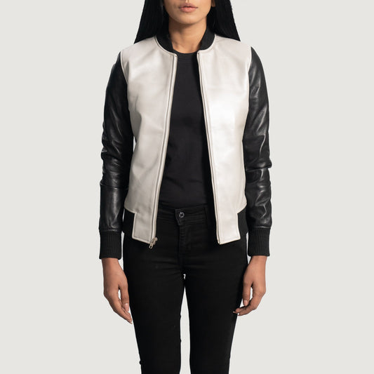 Three-quarter view of the silver and black leather varsity bomber jacket, highlighting its athletic silhouette and sleek zipper closure.