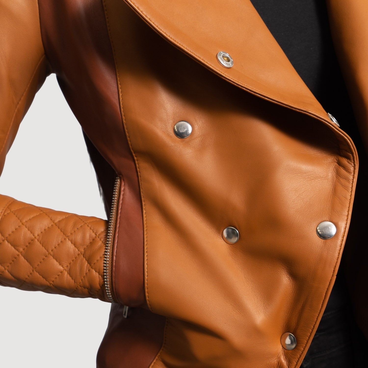 Macro view of the unique overlap design and button closure details.