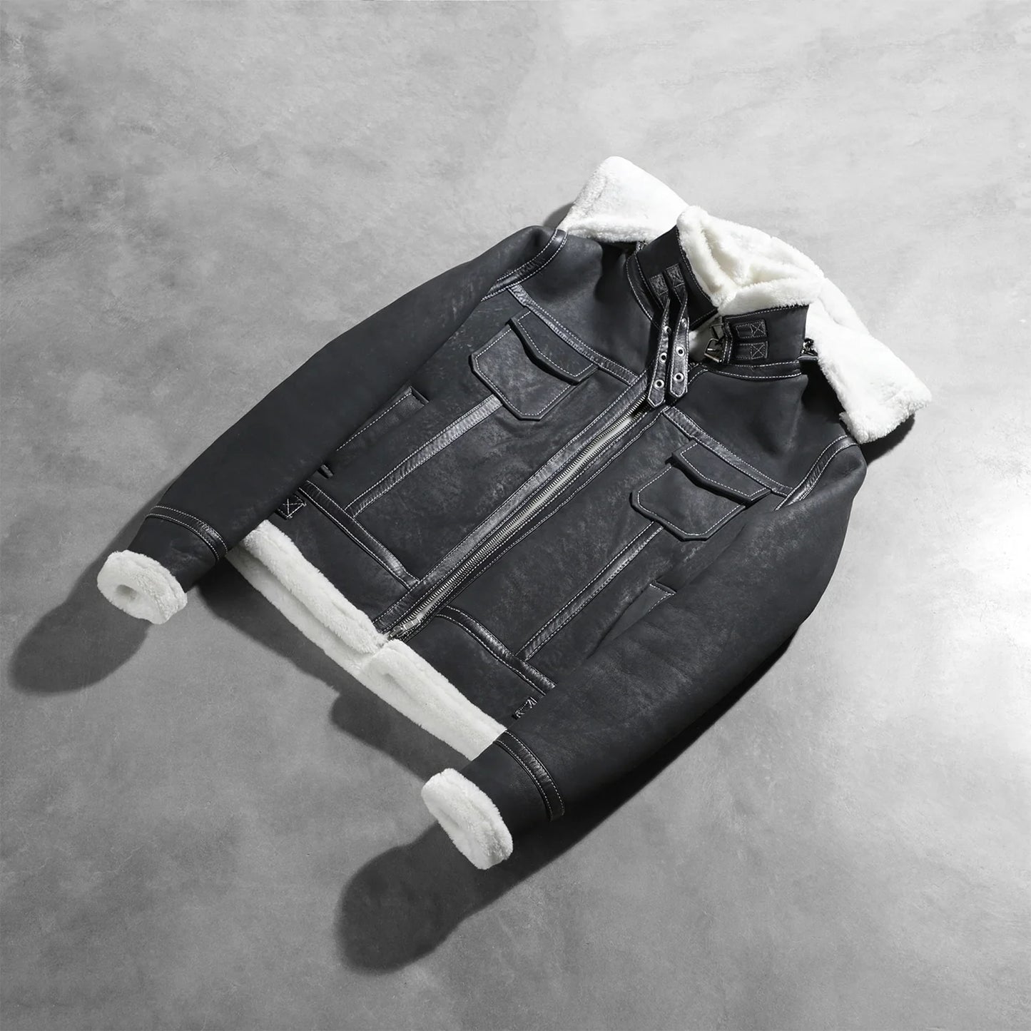 Detail of the fully faux fur lined interior inside the black leather jacket.