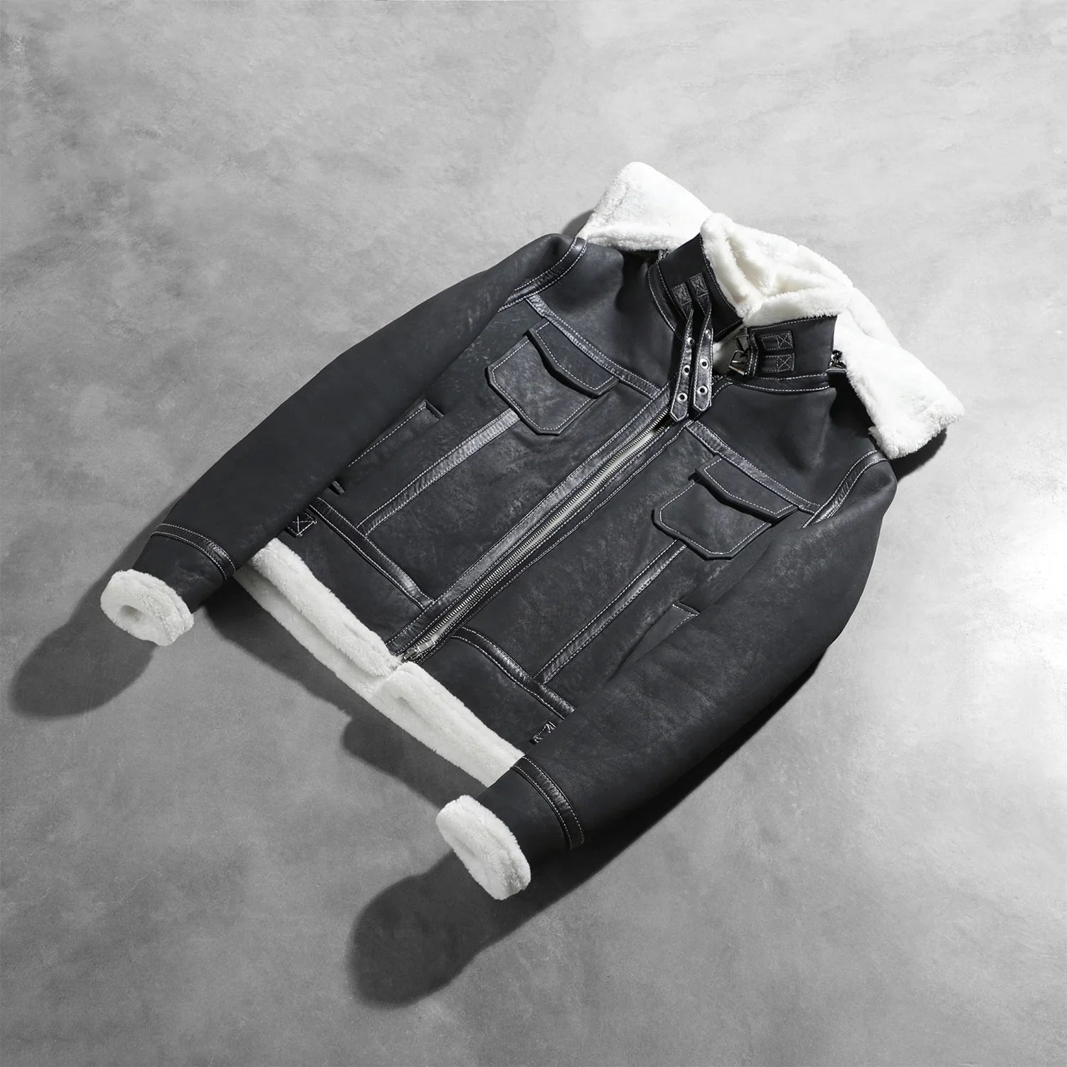 Detail of the fully faux fur lined interior inside the black leather jacket.