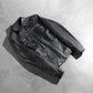 View of the four functional exterior pockets on the front of the black leather.