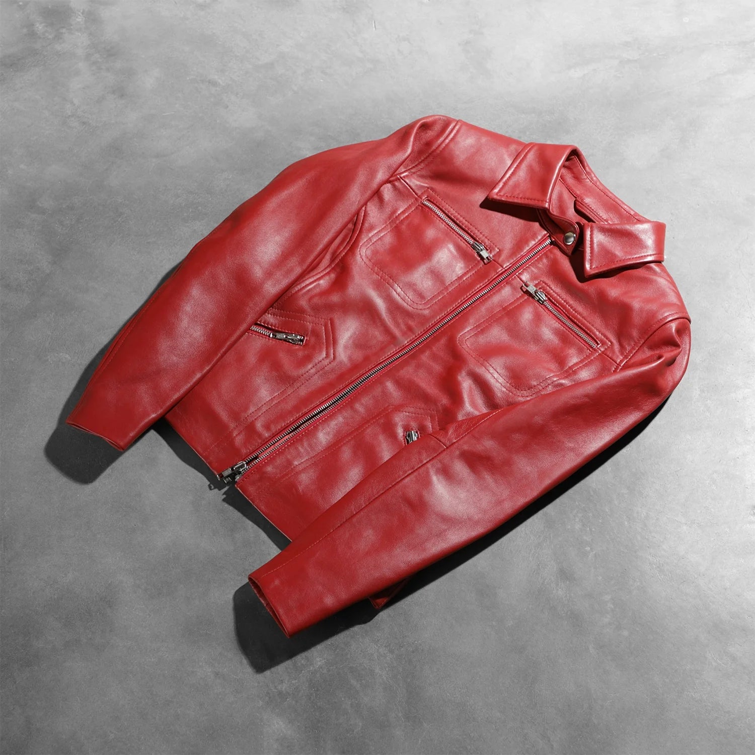 Close up showing the clean open hem cuff design on the sleeves.