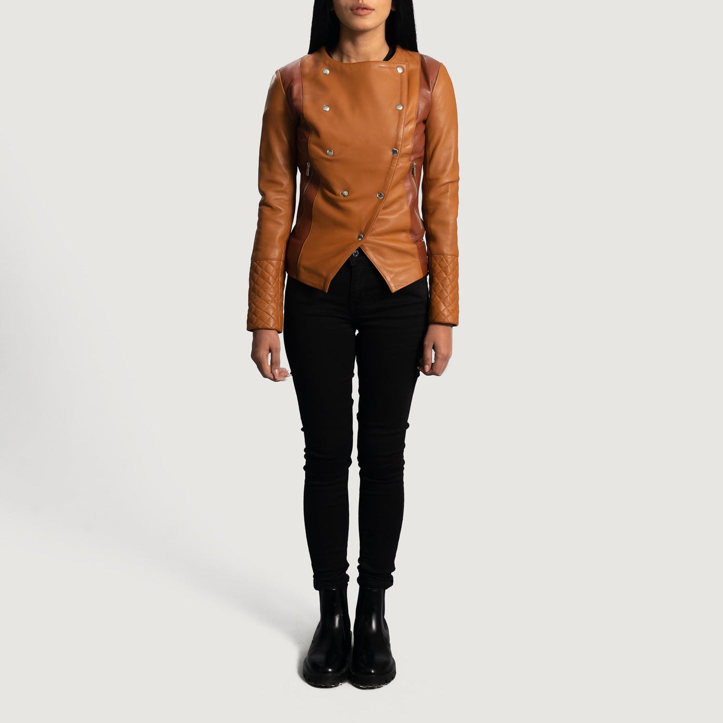 Close up of premium tan brown aniline sheepskin leather texture on a jacket.
