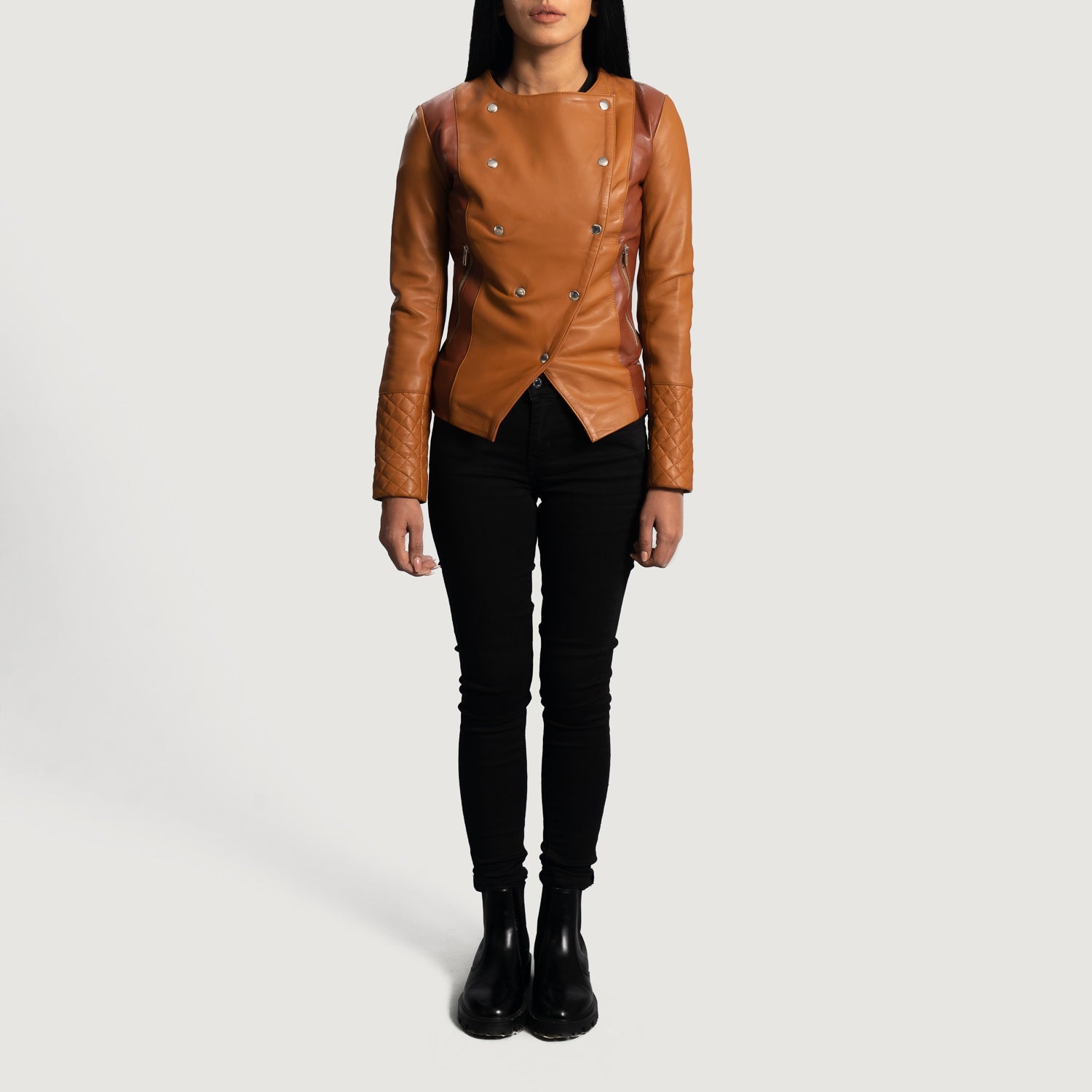 Close up of premium tan brown aniline sheepskin leather texture on a jacket.