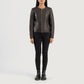 Three quarter profile view of the brown collarless jacket, highlighting its streamlined, minimalist silhouette and tailored fit.