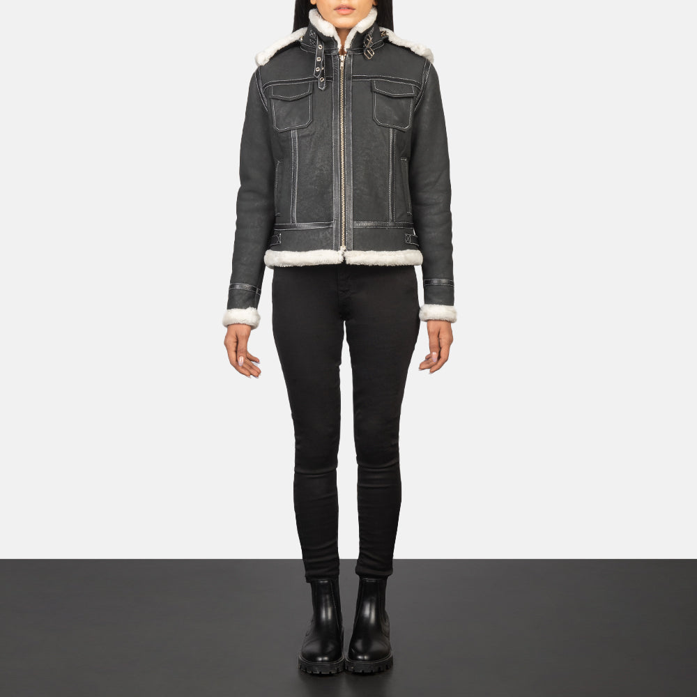 Detail of the open hem sleeve cuffs on the black hooded leather jacket.