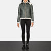 Full back view of the women's green sheepskin leather jacket showing the waist adjustment straps and clean tailored lines.