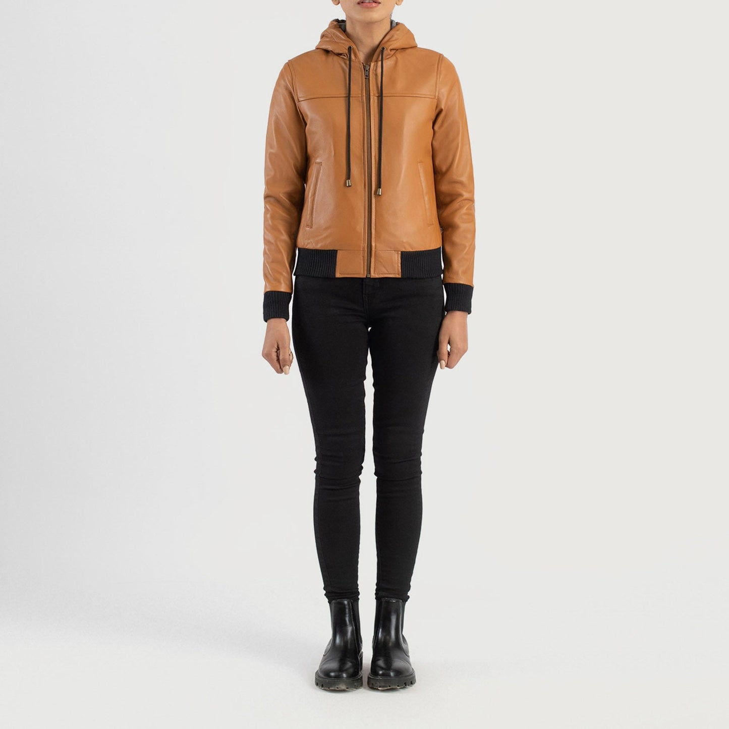 Lifestyle shot of the Rebella Brown hooded leather bomber jacket available at Layzal Jackets.