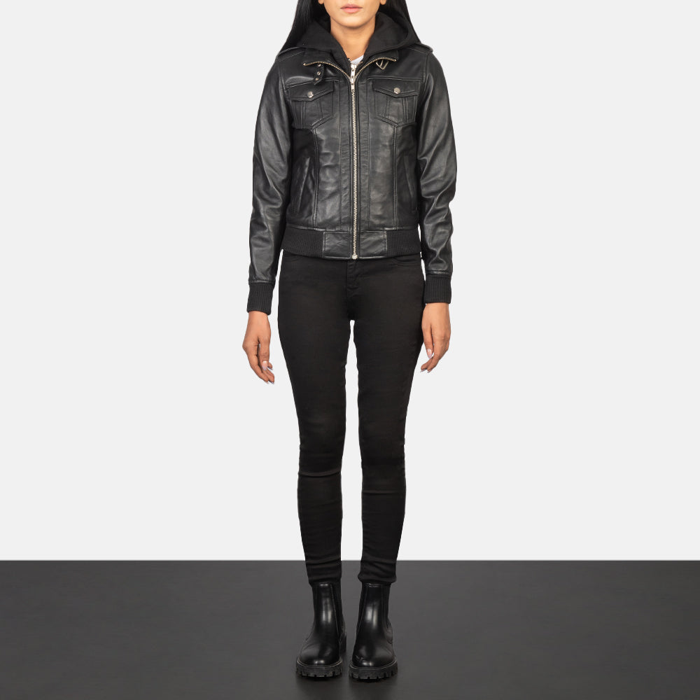 Three quarter profile view of the black leather jacket, highlighting the four functional front pockets and structural athletic silhouette.
