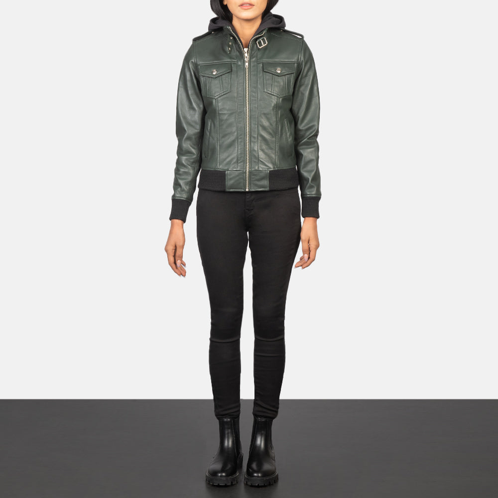 Three-quarter profile view of the green leather jacket, highlighting the four functional front pockets and structural silhouette.