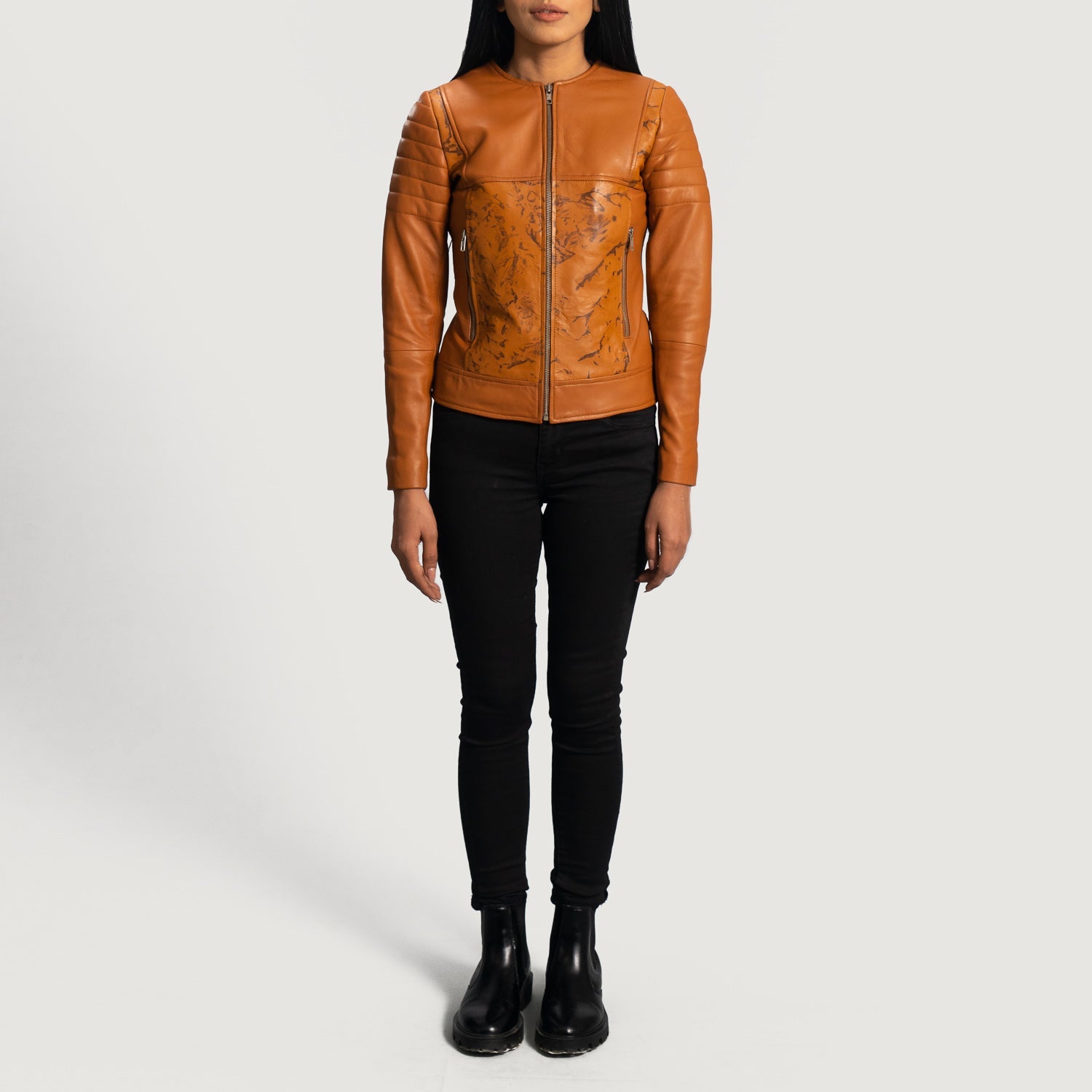 Close up of the unique dip and dye tan brown sheepskin leather texture.