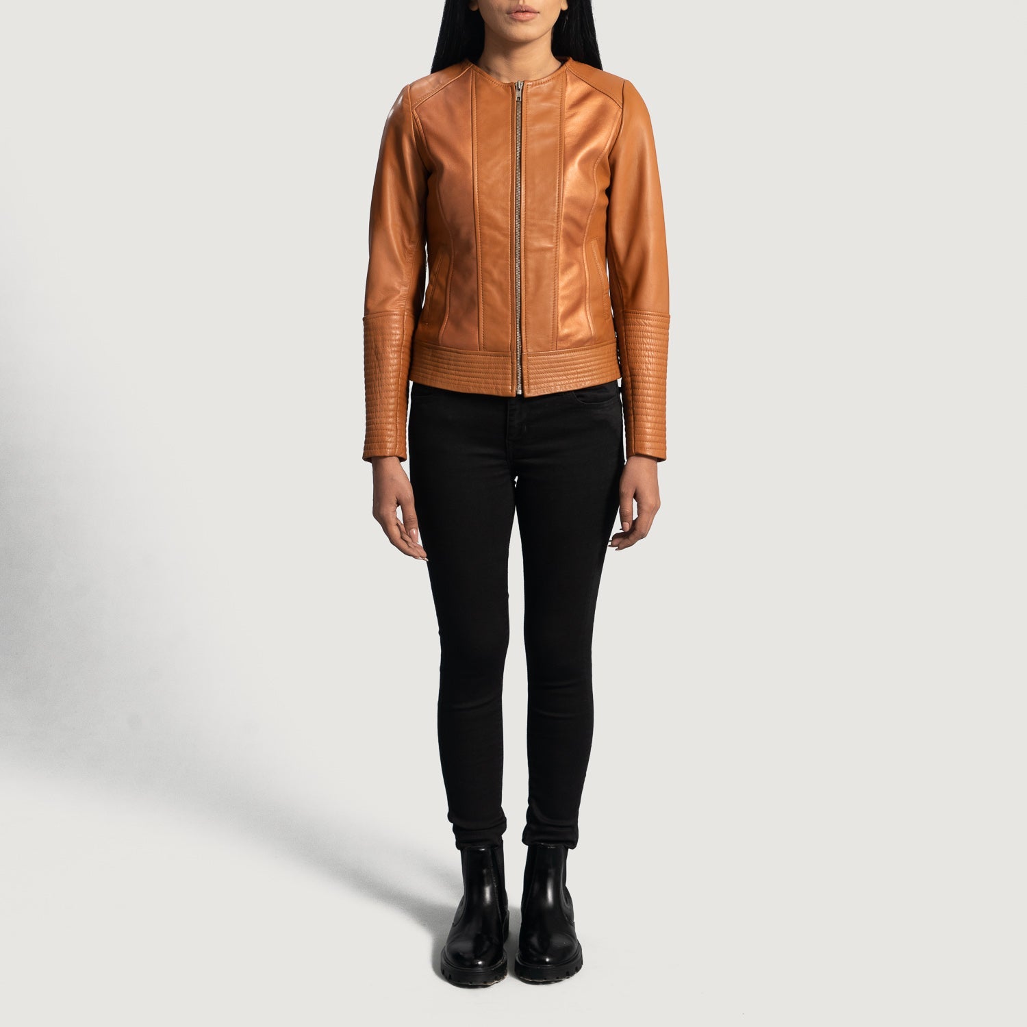 Lifestyle shot of the Sleeky Clean tan leather biker jacket available at Layzal Jackets.