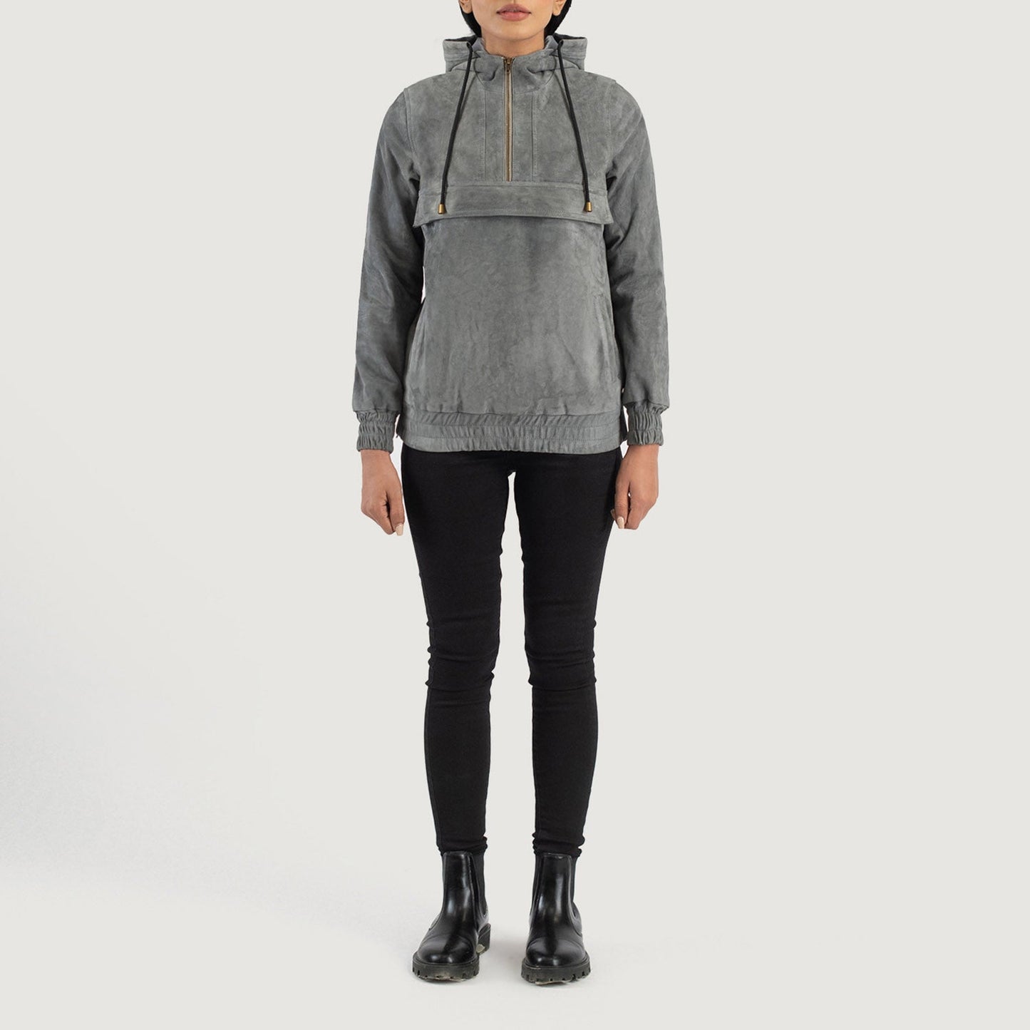Side view of the Zest grey suede jacket showing the convenient zipper opening for easy wear and side welt pockets.