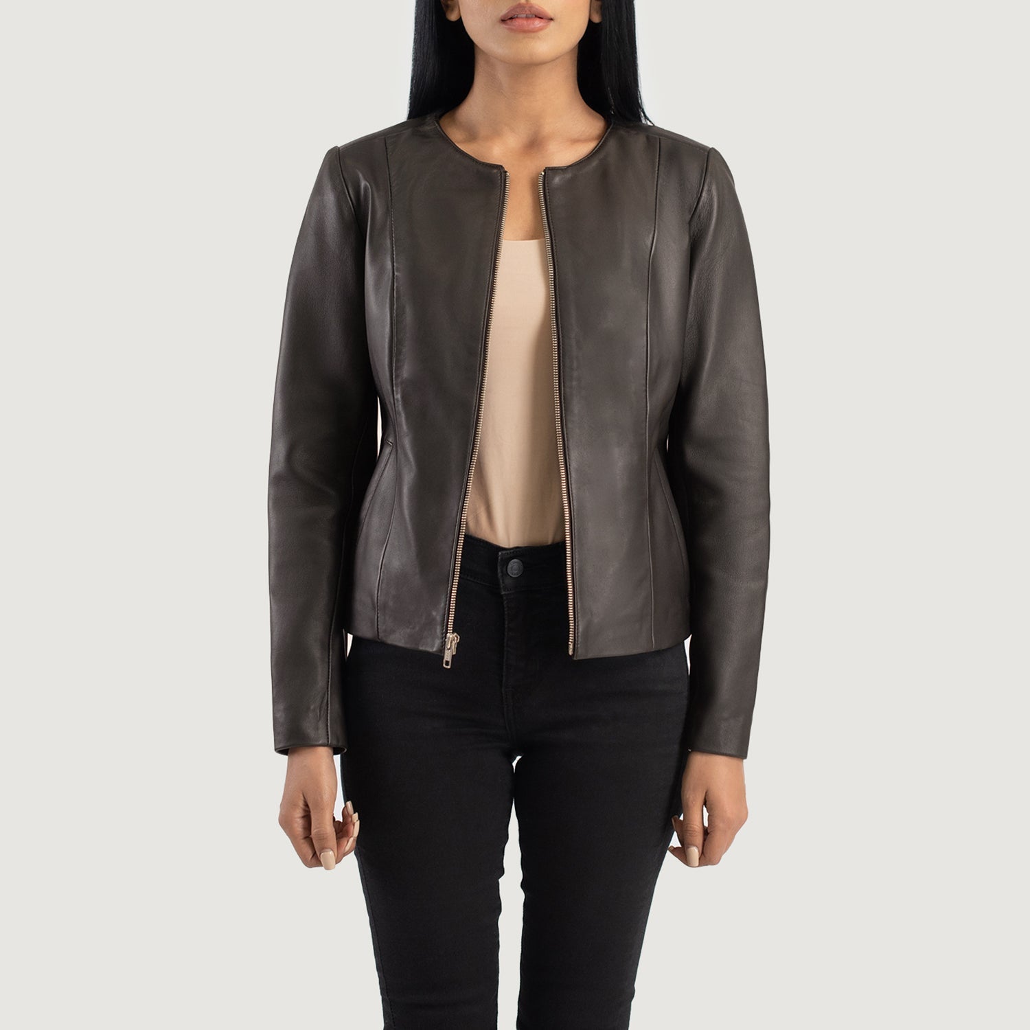 Front view of the Elixir brown leather jacket featuring a modern collarless neckline, central zipper closure, and open hem cuffs.