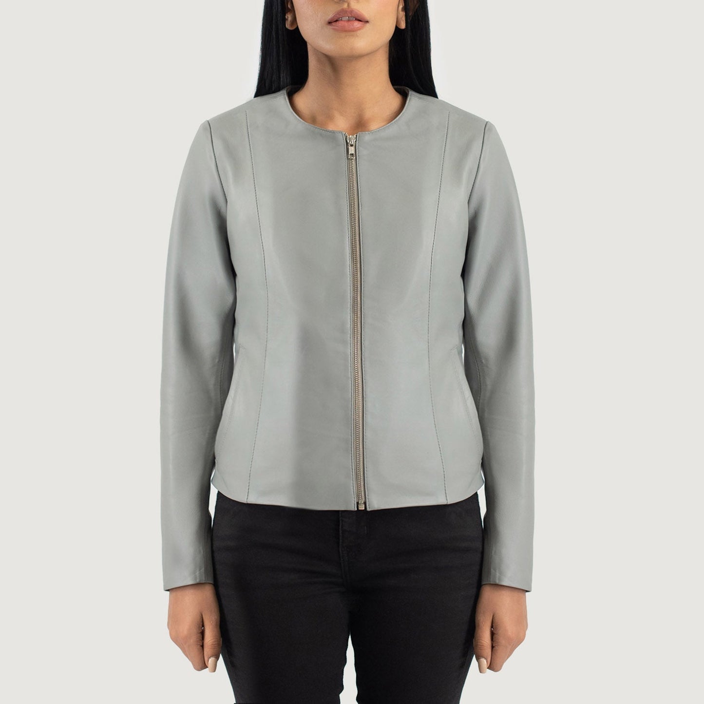 Front view of the Elixir grey leather jacket featuring a modern collarless neckline, central zipper closure, and open hem cuffs.