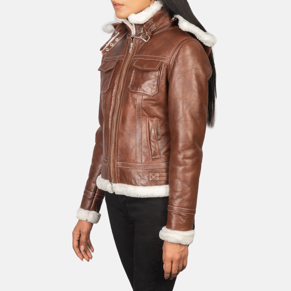 Close up of premium snuffed sheepskin leather texture on a brown shearling jacket.