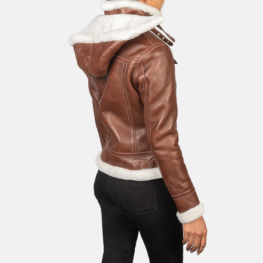 Detail of the removable hood feature on the brown shearling leather jacket.