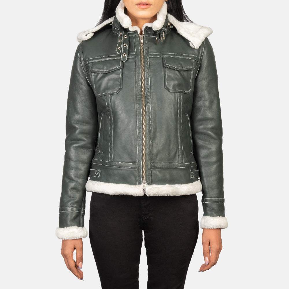 Front view of the Fiona green hooded shearling leather jacket with zipper closure and high neck belt detail.