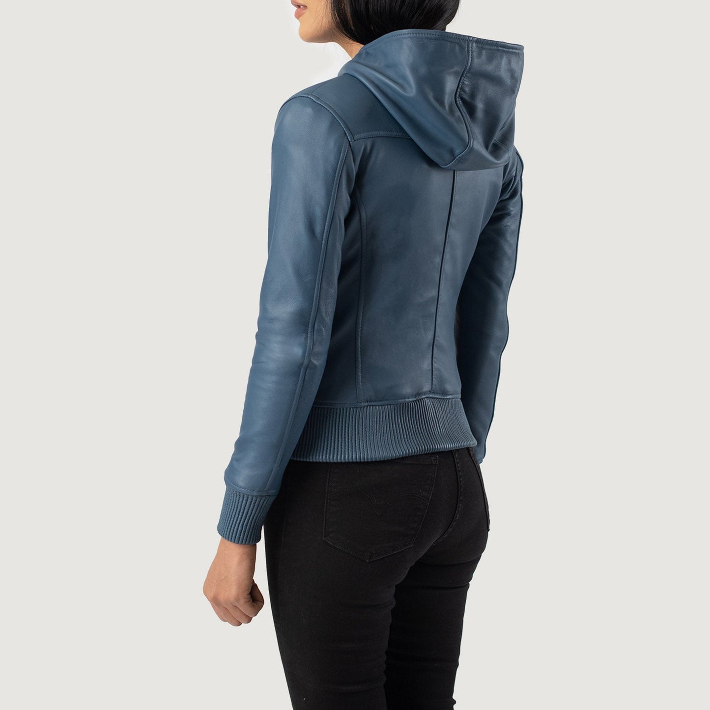 Close up of the sturdy front zipper closure and hardware on the bomber jacket.