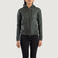Detailed front view focusing on the layout of the three functional outside pockets on the green leather bomber jacket.