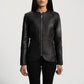 Detail of the durable quilted polyester lining inside the black leather jacket.
