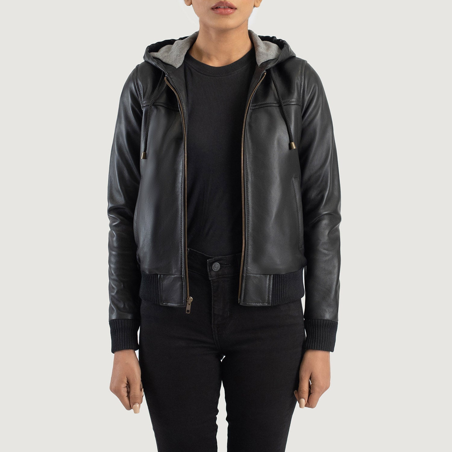 Front view of the Rebella black hooded leather bomber jacket featuring a central front zipper closure and matching black rib knit cuffs and hem.