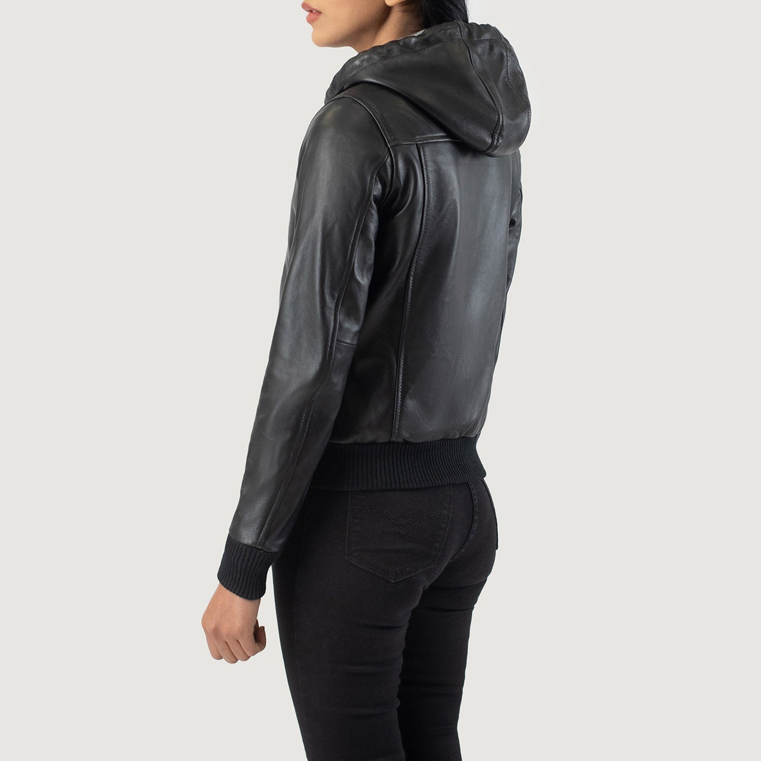 Close up of the attached leather hood and high quality front zipper hardware on the black leather jacket.