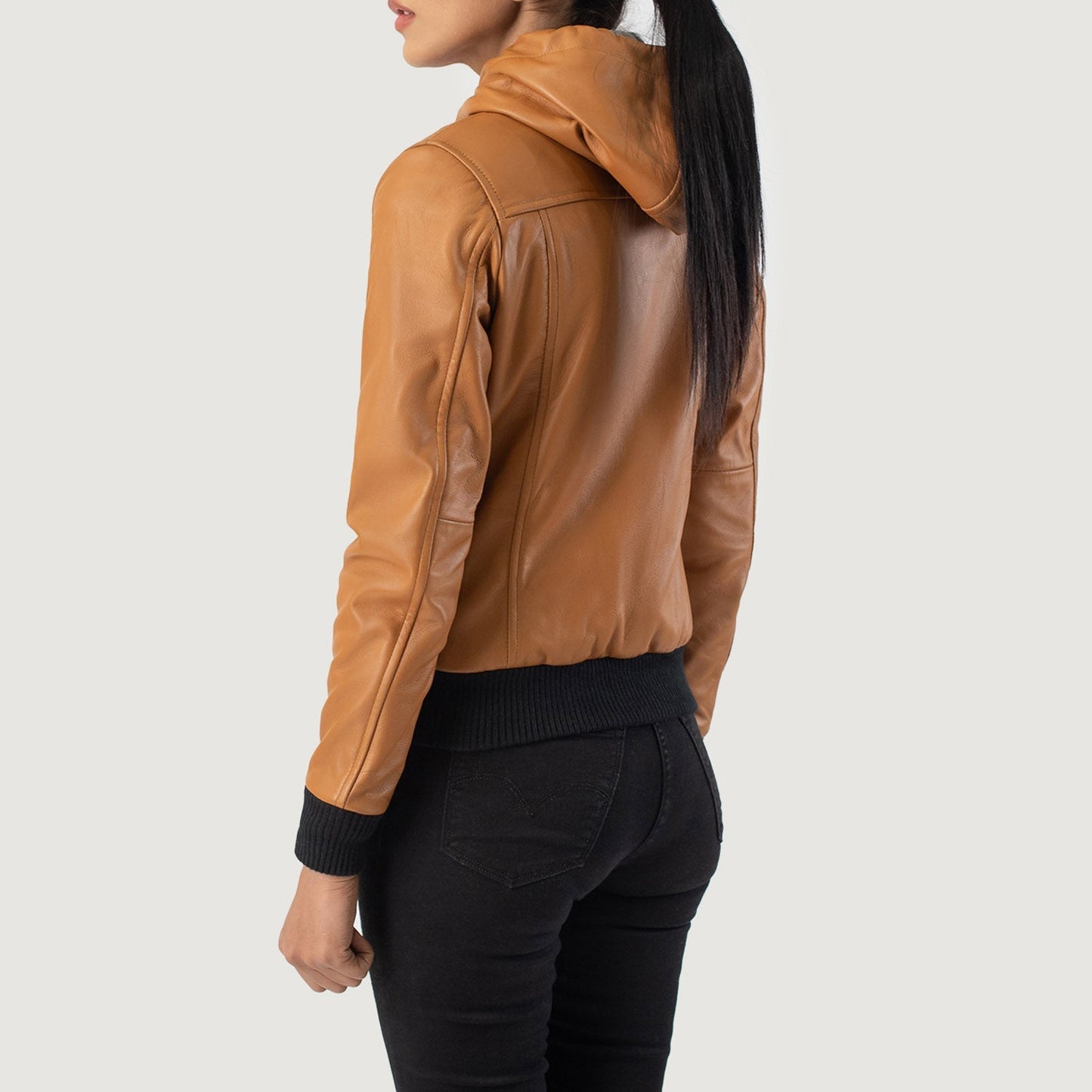  Detail of soft interior fleece lining inside the brown leather bomber.