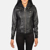 Close up shot of the classic leather shoulder epaulettes with precise stitching on the black sheepskin jacket.