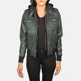 Front view of the green sheepskin leather jacket featuring a high-neck belted collar, shoulder epaulettes, and a removable fabric hood.