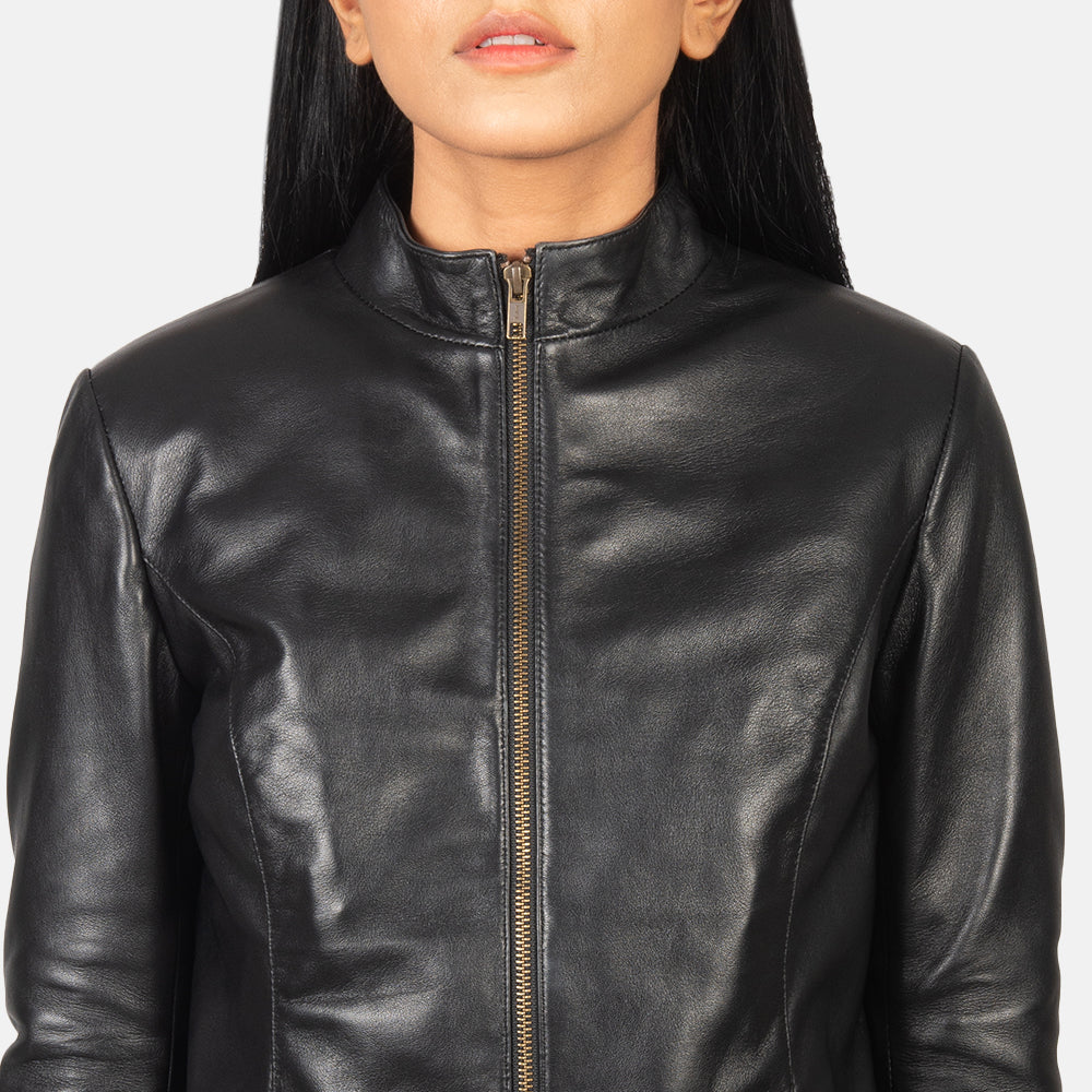 Macro view of the structured mandarin collar style on the leather jacket.
