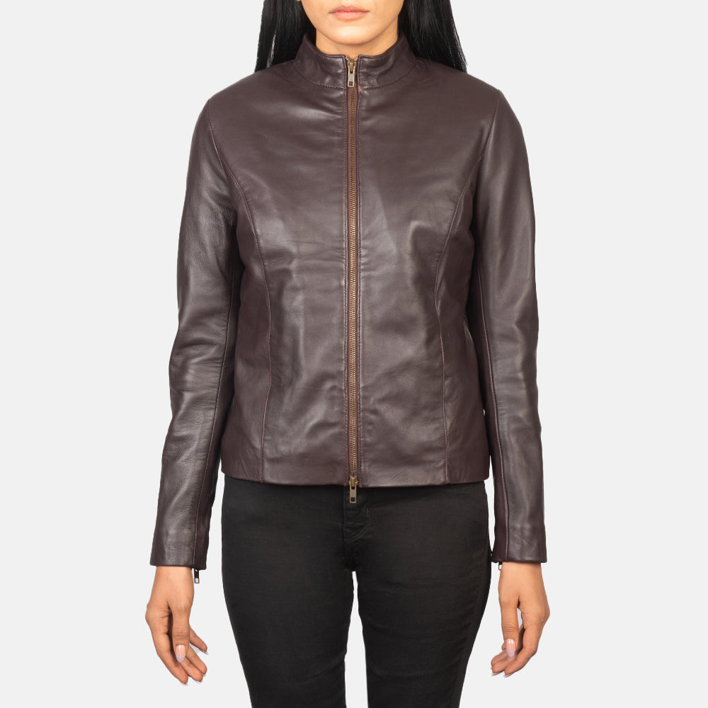 Close up of rich maroon semi aniline sheepskin leather texture on a biker jacket.