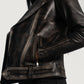 Close up of the rugged rub off goatskin leather texture in distressed brown.
