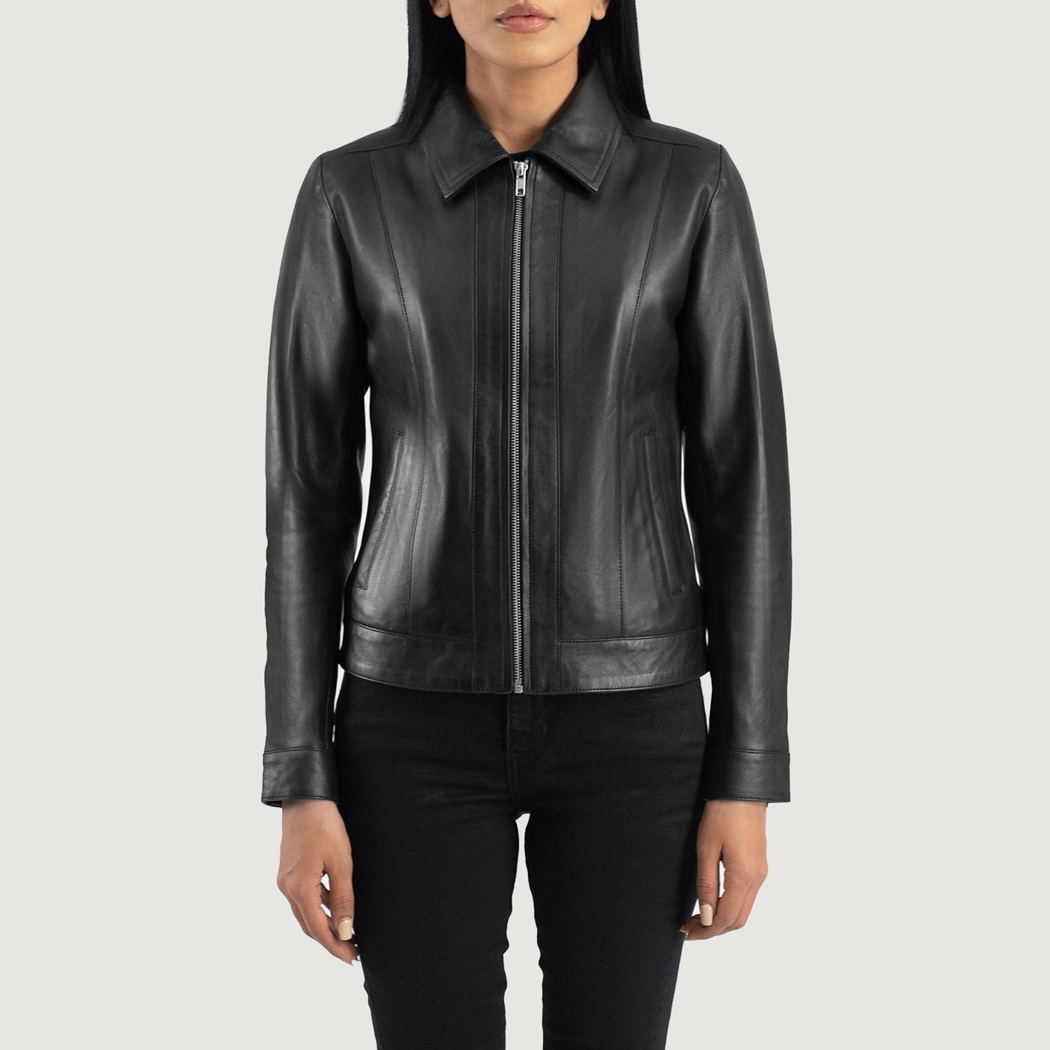 Close up of premium black semi aniline sheepskin leather texture on a classic jacket.