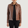 Front view of the Vixen brown leather jacket featuring a classic shirt style collar, central zipper closure, and structured waist pockets.