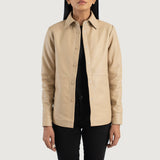 Front view of the Zenith beige leather shirt jacket showcasing its clean pocketless design and front leather button closures.
