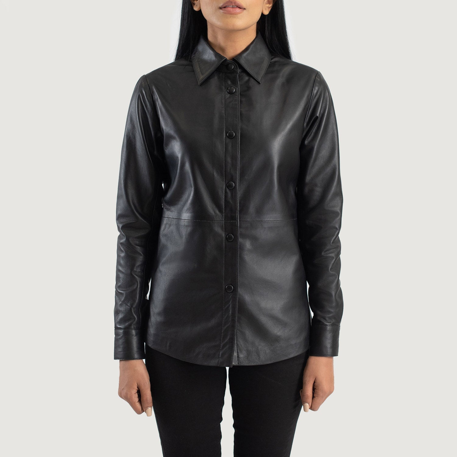 Close up of premium black semi aniline sheepskin leather texture on a shirt jacket.