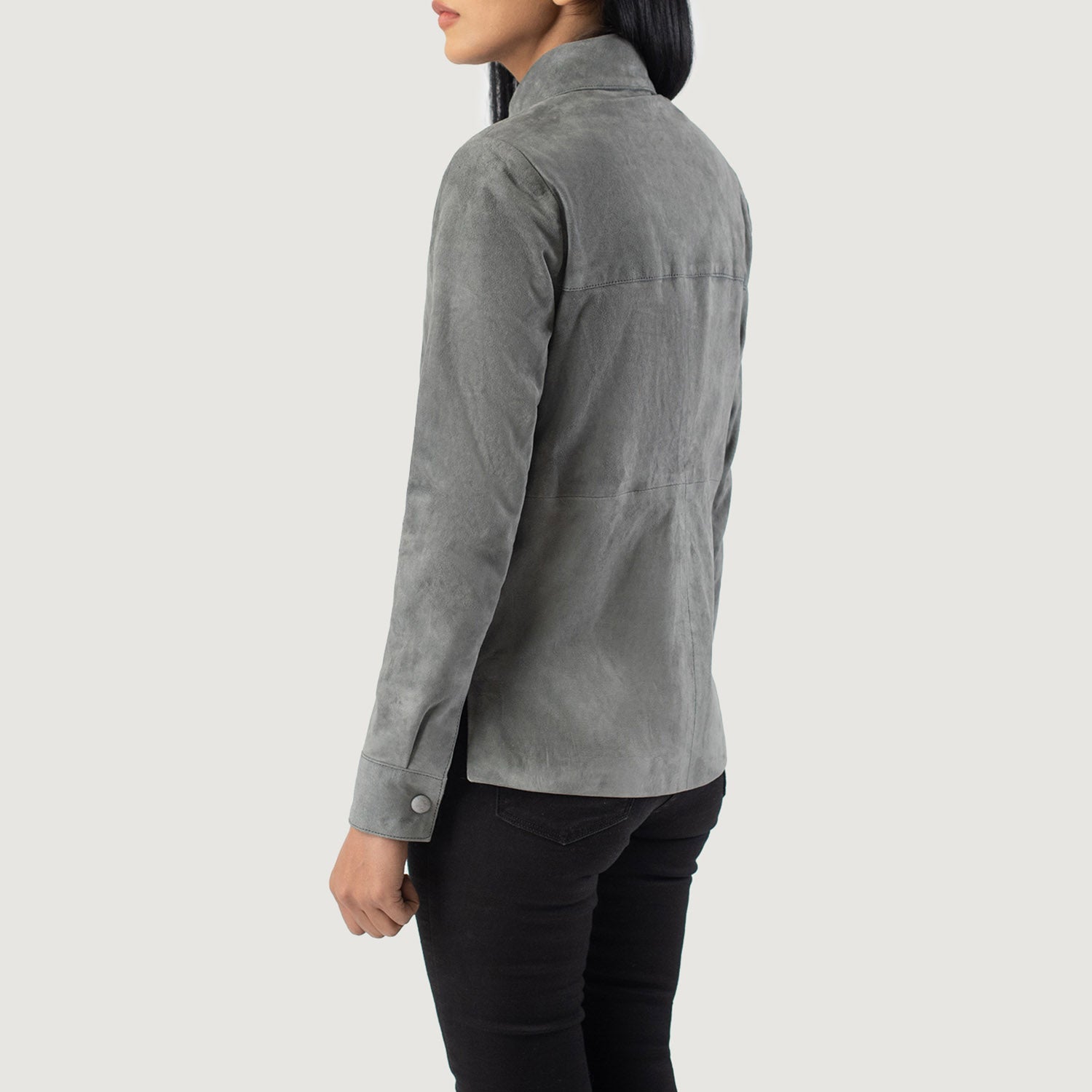 Close up of the crisp, structured shirt style collar crafted from premium grey sheepskin suede.