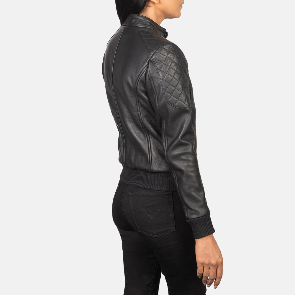 Detail of the luxurious quilted viscose lining inside the tan leather biker.