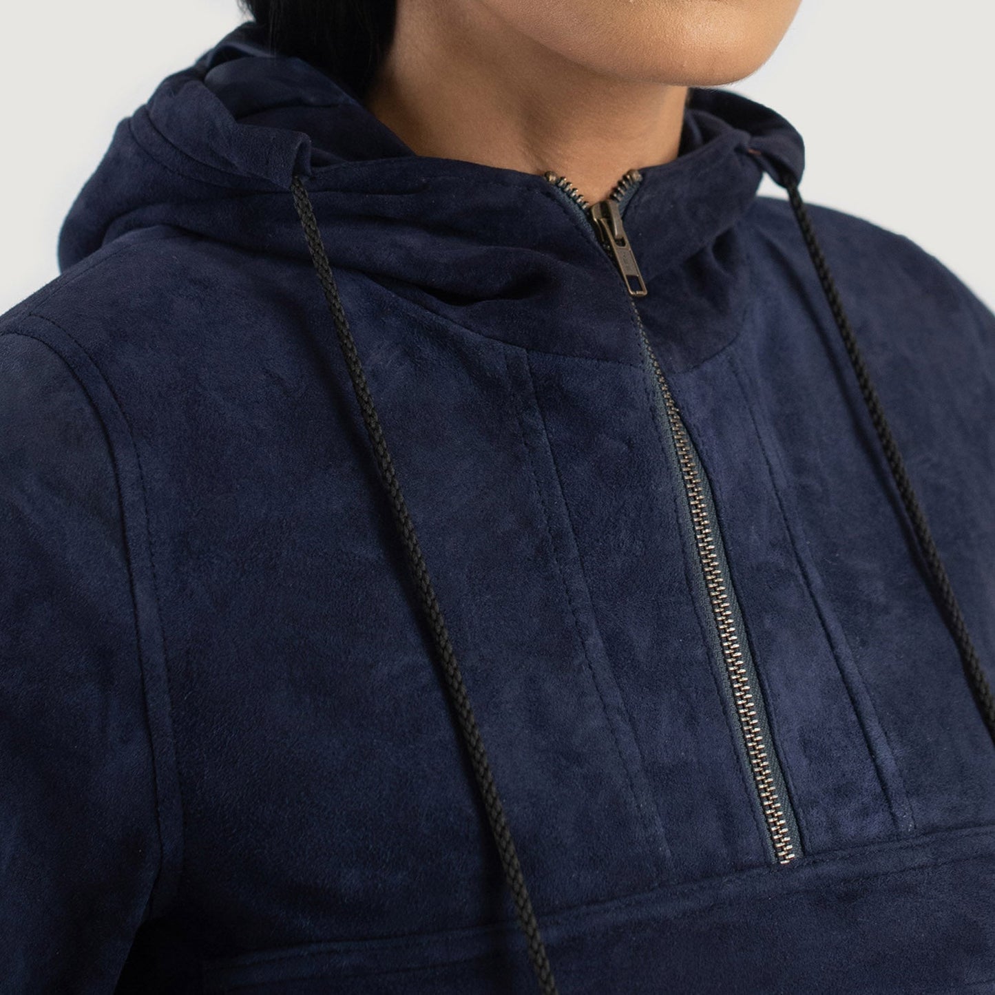 4. Close up of premium sheepskin suede texture on a blue hooded pullover.