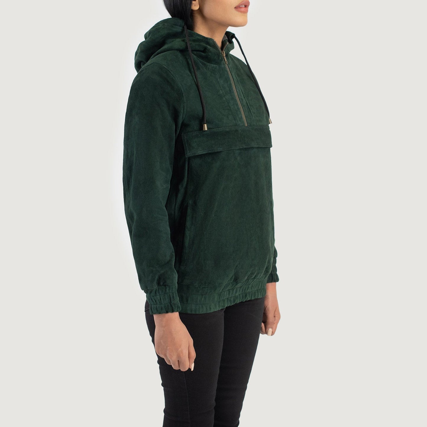 Close up of premium goat skin suede texture on a green hooded pullover.