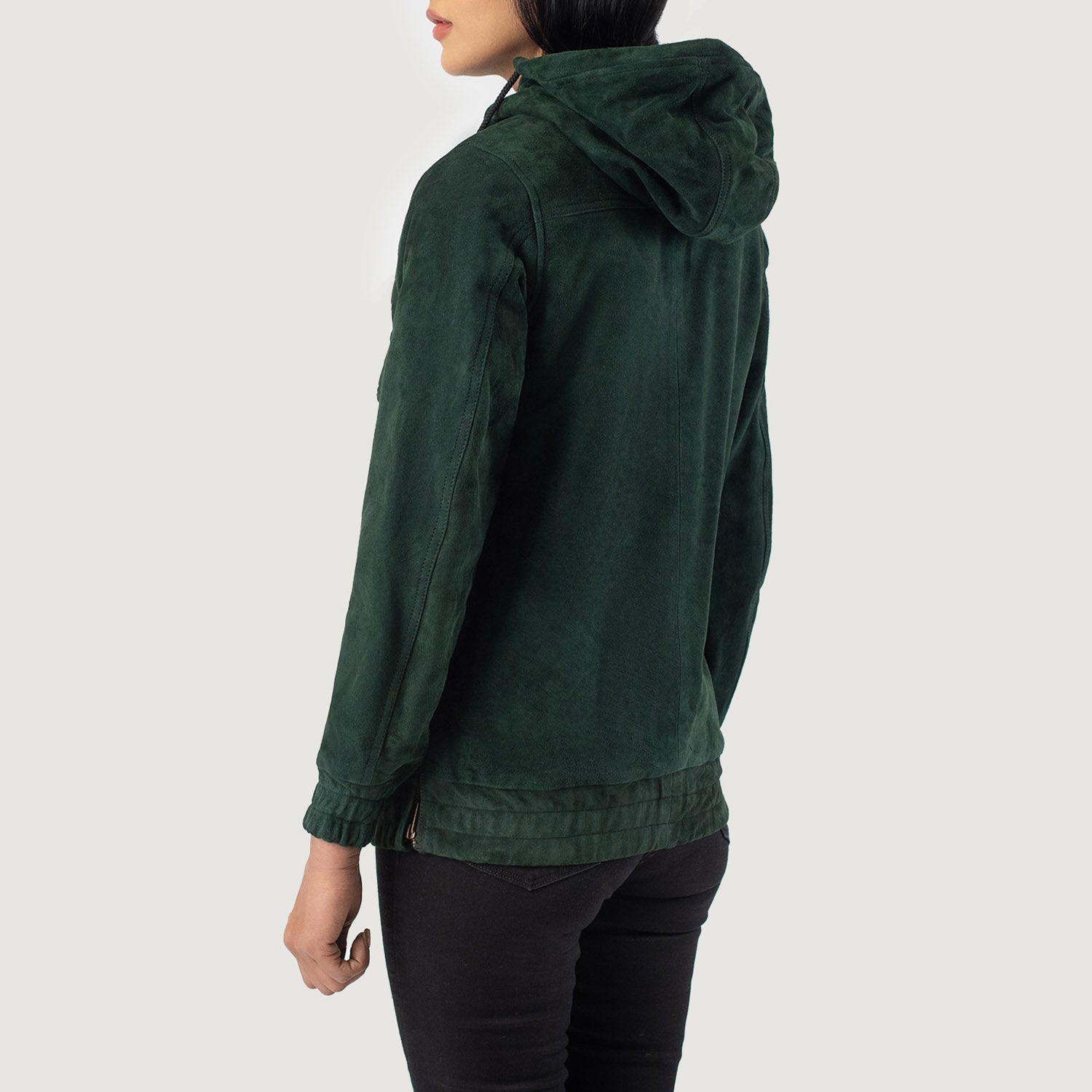 Detailed view of the functional side zipper opening on the Zest Green hooded jacket.