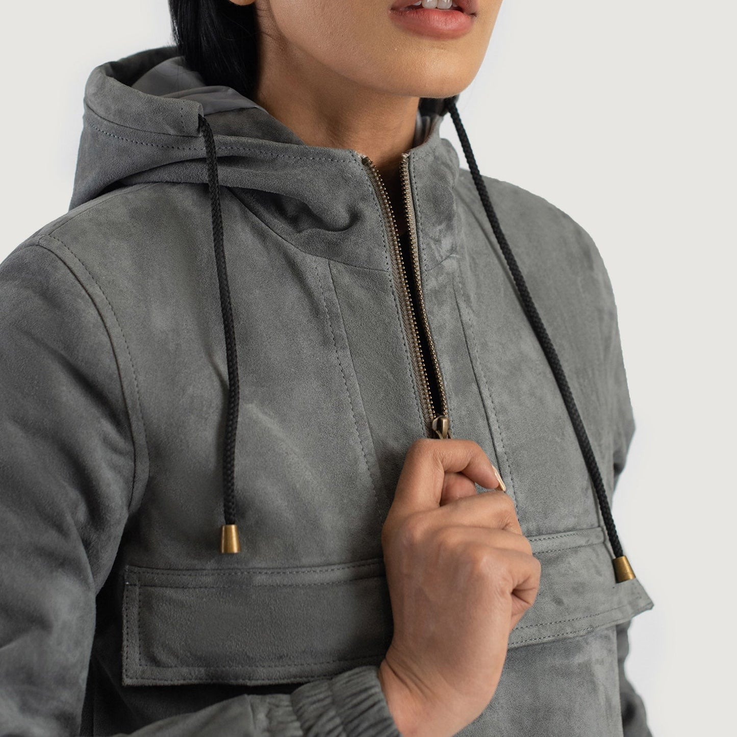 Close up of the hooded collar and premium suede finish on the Zest grey pullover jacket.